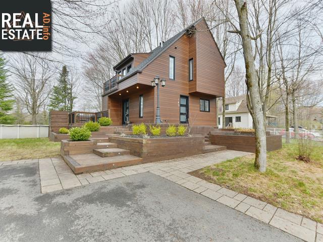 Property 140 Boul. Normandie main img