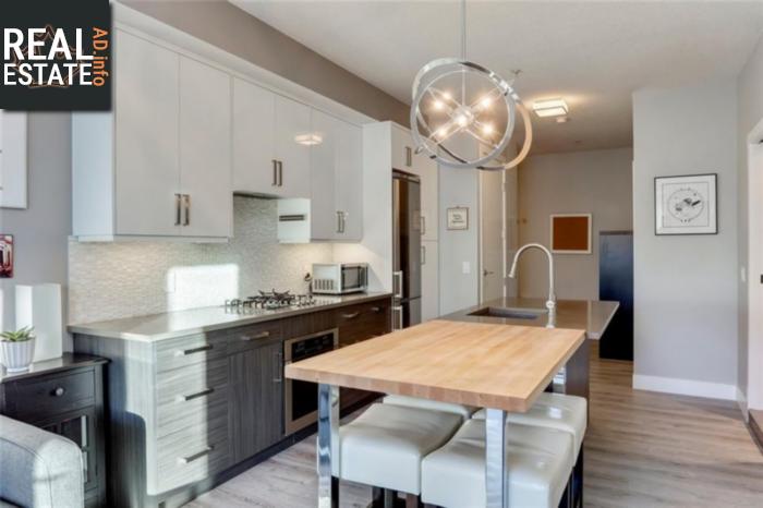 Property #104 1521 26 Av Sw main img