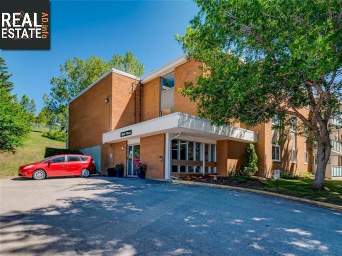Property #469 1620 8 Av Nw main img
